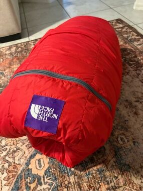 The North Face Red Packable Puffer with Purple Logo Patch